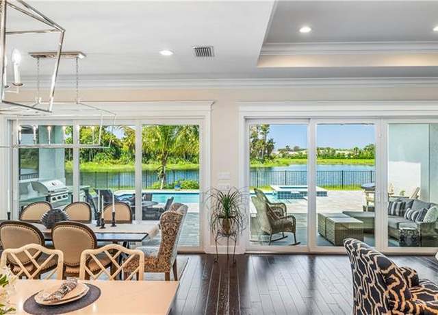 Property at 12043 Datura Pl, Naples, FL 34120, 4 beds, 4.5 baths