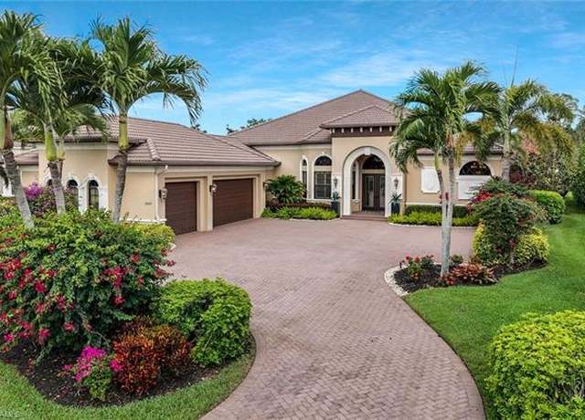 Property at 5869 Hammock Isles Cir, Naples, FL 34119, 4 beds, 4.5 baths