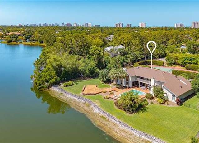 Property at 154 Cajeput Dr, Naples, FL 34108, 5 beds, 5 baths