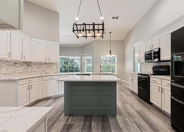 Property at 303 Burnt Pine Dr, Naples, FL 34119, 4 beds, 3 baths