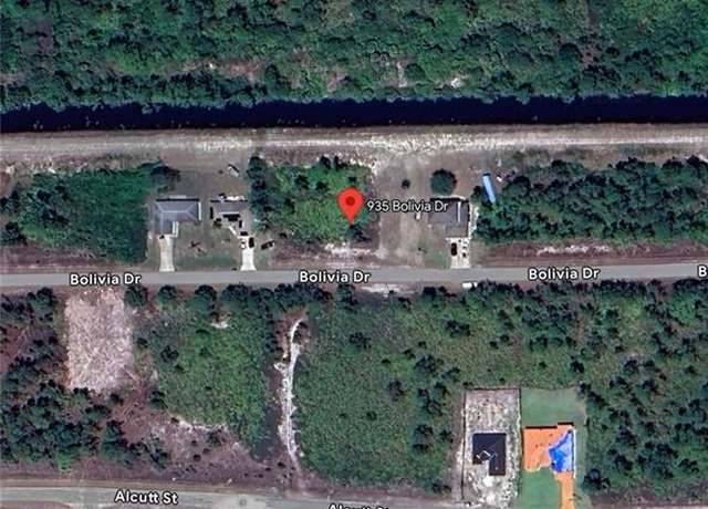 Property at 935 Bolivia Dr, Lehigh Acres, FL 33974