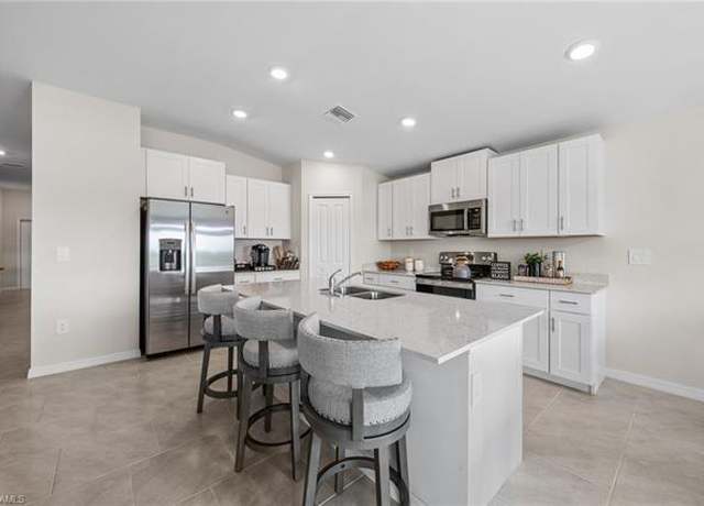 Property at 12265 Savanna Lakes Blvd, Lehigh Acres, FL 33974, 4 beds, 2 baths
