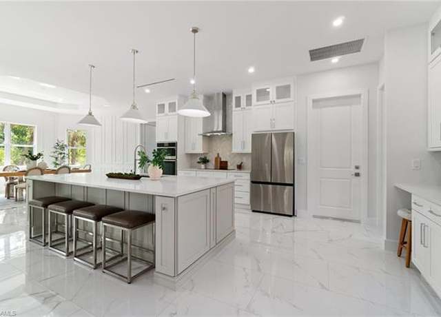 Property at 1970 17th St SW, Naples, FL 34117, 4 beds, 3 baths