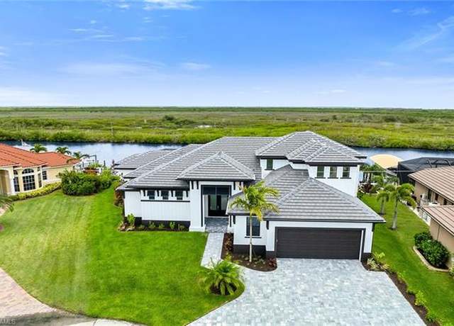 Property at 1600 NW 44th Ave, Cape Coral, FL 33993, 4 beds, 4 baths