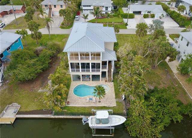 Property at 4741 Spring Creek Dr, Bonita Springs, FL 34134, 4 beds, 3 baths