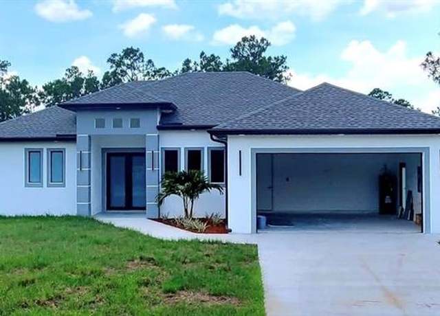 Property at 814 Fullerton Ave S, Lehigh Acres, FL 33974, 3 beds, 2.5 baths
