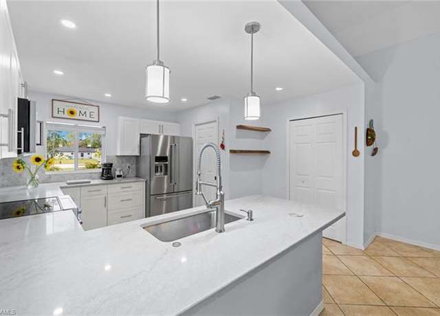 Property at 5160 44th St NE, Naples, FL 34120, 3 beds, 2 baths