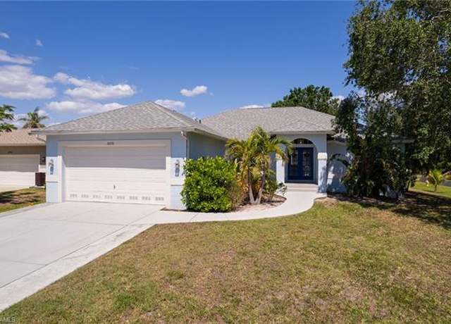 Property at 8970 Woodgate Manor Ct, Fort Myers, FL 33908, 4 beds, 2 baths