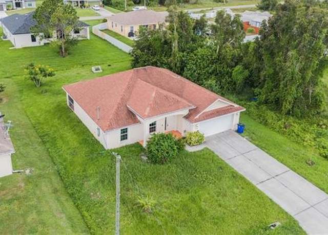 Property at 2607 24th St SW, Lehigh Acres, FL 33976, 3 beds, 2 baths