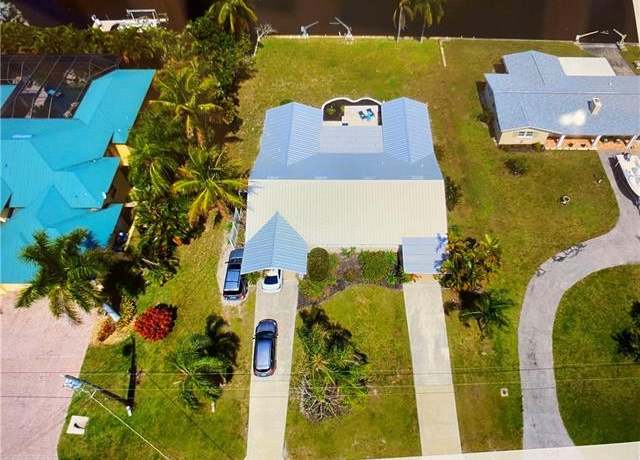 Property at 4822-4824 Esplanade St, Bonita Springs, FL 34134, 4 beds, 2 baths
