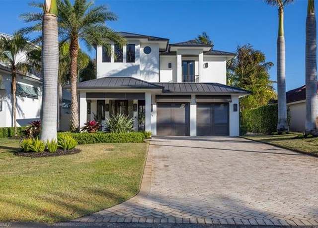 Property at 565 Fairway Ter, Naples, FL 34103, 4 beds, 5 baths
