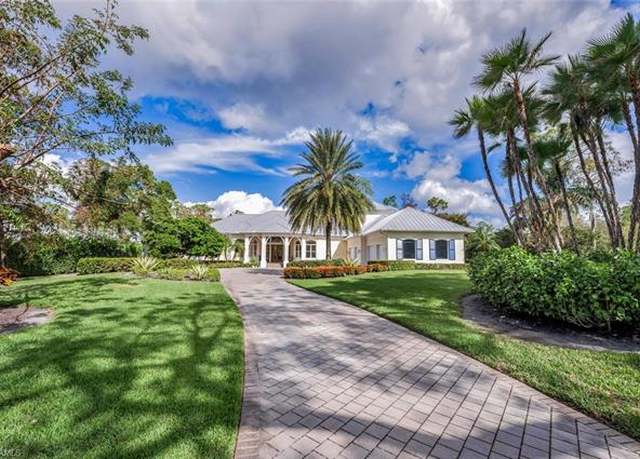 Property at 7051 Hunters Rd, Naples, FL 34109, 5 beds, 5 baths