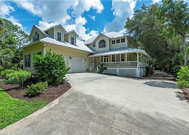 Property at 5070 Palmetto Woods Dr, Naples, FL 34119, 5 beds, 5.5 baths