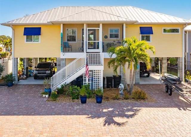Property at 24536 Dolphin St, Bonita Springs, FL 34134, 3 beds, 2 baths
