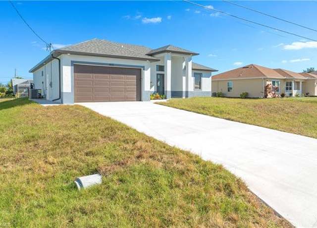 Property at 1407 NE 5th Ave, Cape Coral, FL 33909, 4 beds, 2 baths