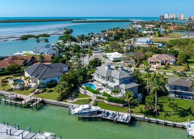 Property at 1051 E Inlet Dr, Marco Island, FL 34145, 4 beds, 4.5 baths