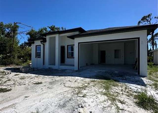 Property at 205 Australian Dr, Rotonda West, FL 33947, 3 beds, 2.5 baths
