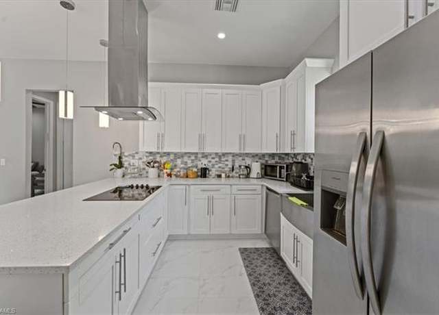 Property at 3219 64th Ave NE, Naples, FL 34120, 4 beds, 3 baths