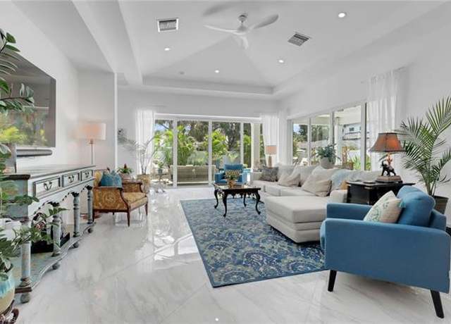 Property at 1262 10th St N, Naples, FL 34102, 3 beds, 3.5 baths