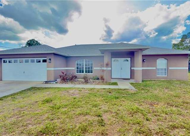 Property at 528 Peerless Cir, Lehigh Acres, FL 33974, 3 beds, 2 baths
