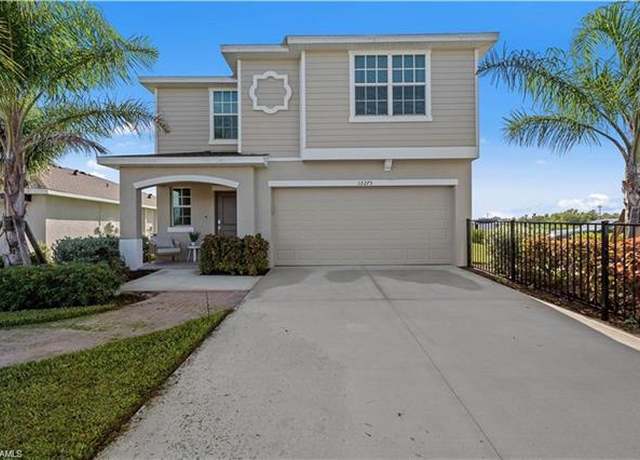 Property at 12275 Savanna Lakes Blvd, Lehigh Acres, FL 33974, 5 beds, 2.5 baths
