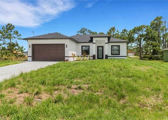 Property at 2911 28th St SW, Lehigh Acres, FL 33976, 3 beds, 2 baths