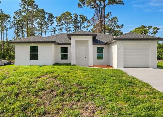 Property at 2804 64th St W, Lehigh Acres, FL 33971, 3 beds, 2 baths