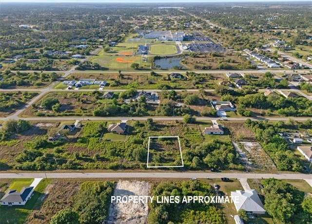 Property at 820 Casper Yost St E, Lehigh Acres, FL 33974