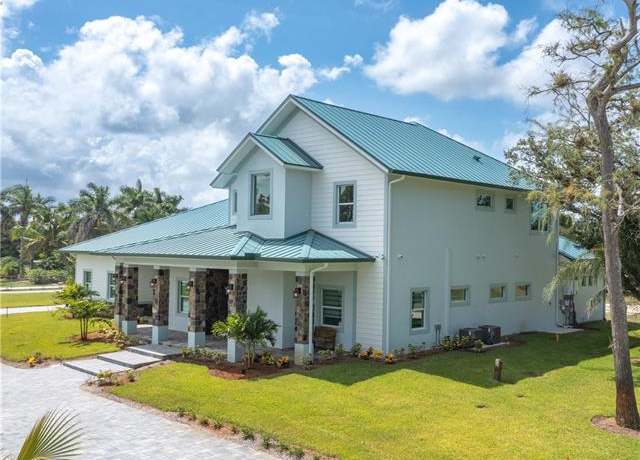 Property at 256 Price St, Naples, FL 34113, 5 beds, 5 baths