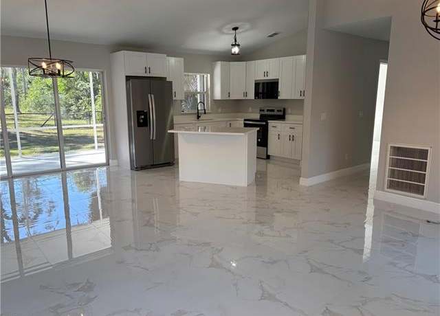 Property at 4430 18th Ave NE, Naples, FL 34120, 3 beds, 2 baths