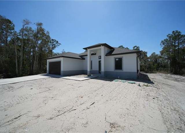 Property at 712 Goldwyn Ave S, Lehigh Acres, FL 33974, 4 beds, 2 baths