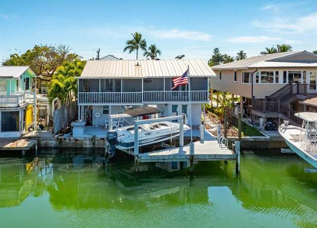 Property at 565 Coconut Ave, Goodland, FL 34140, 5 beds, 4 baths