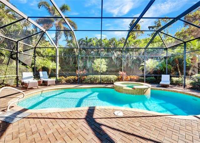 Property at 5620 Hammock Isles Dr, Naples, FL 34119, 3 beds, 3 baths