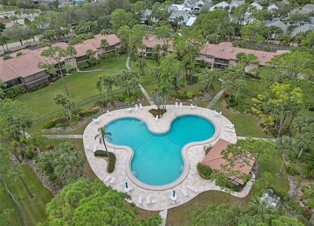 Property at 3207 Horse Carriage Way #406, Naples, FL 34105, 2 beds, 2 baths