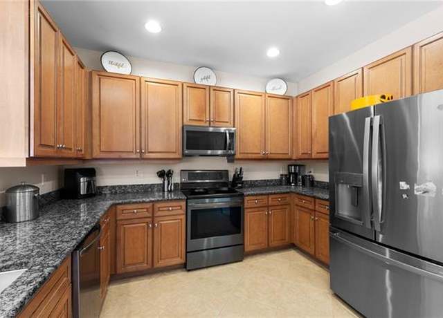 Property at 8364 Laurel Lakes Blvd, Naples, FL 34119, 5 beds, 3 baths