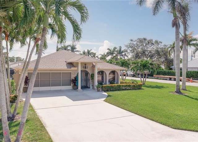 Property at 700 106th Ave N, Naples, FL 34108, 3 beds, 2 baths