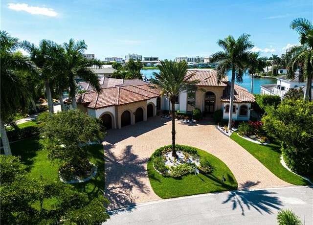 Property at 3111 Leeward Ln, Naples, FL 34103, 5 beds, 4.5 baths