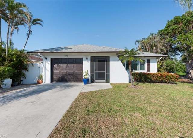 Property at 575 97th Ave N, Naples, FL 34108, 3 beds, 2 baths