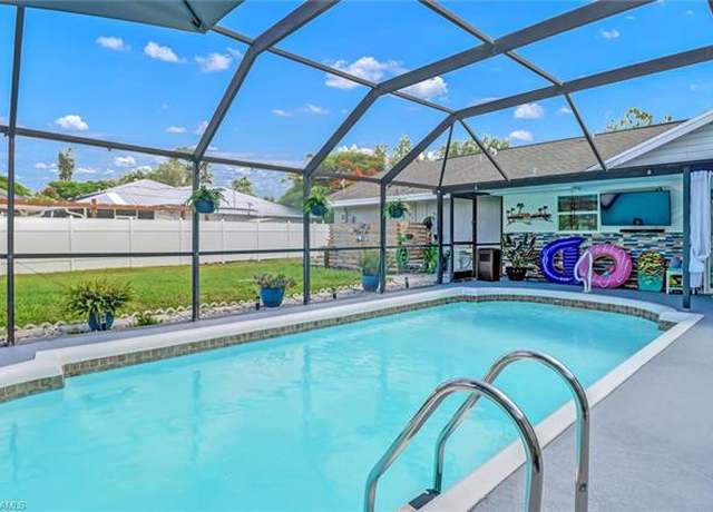 Property at 2809 50th St SW, Naples, FL 34116, 4 beds, 3 baths