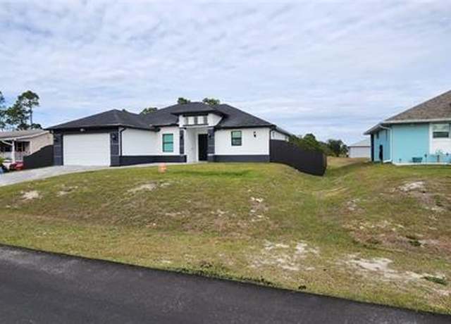 Property at 2908 9th St SW, Lehigh Acres, FL 33976, 3 beds, 2 baths