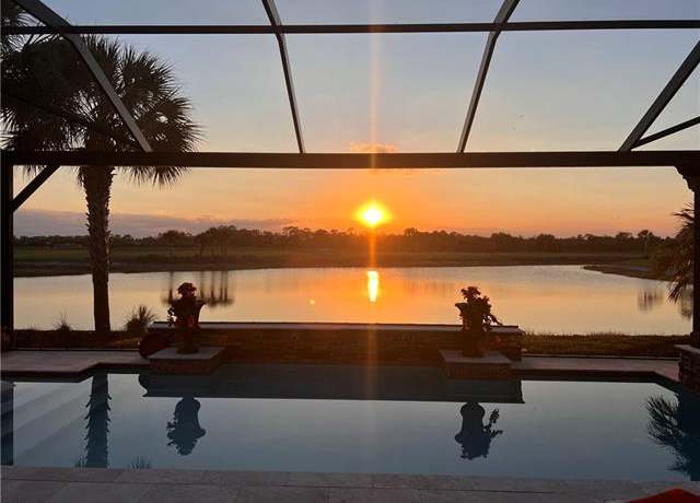 Property at 9435 Night Heron Ln, Naples, FL 34120, 4 beds, 4 baths