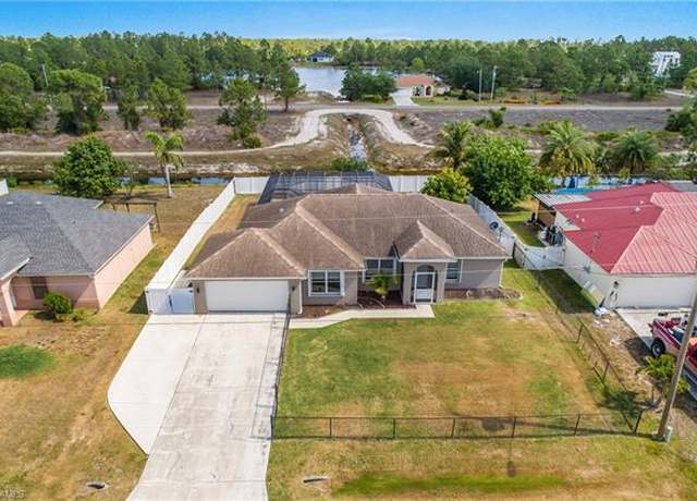 Property at 1227 Damen St E, Lehigh Acres, FL 33974, 3 beds, 2 baths