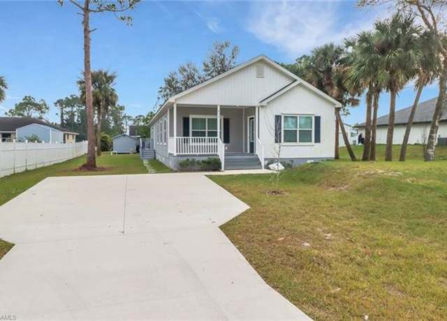 Property at 838 Porter St E, Lehigh Acres, FL 33974, 4 beds, 2.5 baths