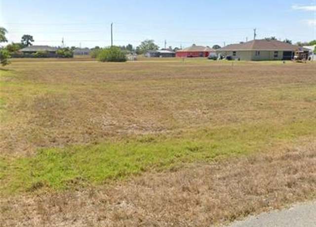 Property at 1218 NW 14th Ave, Cape Coral, FL 33993