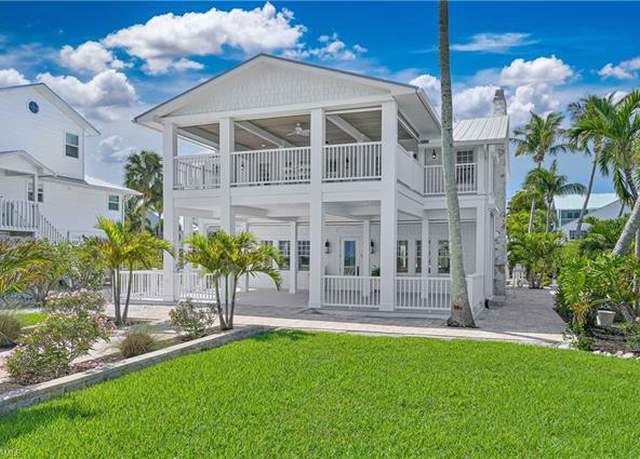 Property at 8241 Main St, Bokeelia, FL 33922, 4 beds, 5 baths