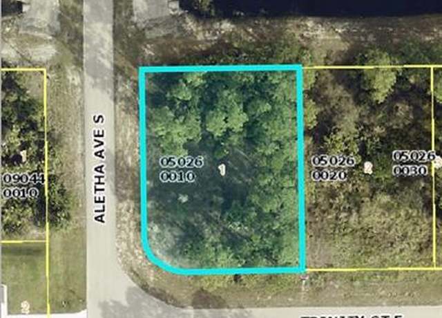 Property at 505 Trinity St E, Lehigh Acres, FL 33974