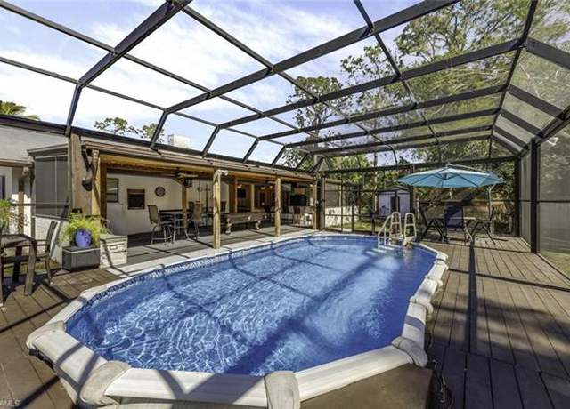 Property at 3032 63rd St SW, Naples, FL 34105, 4 beds, 3 baths