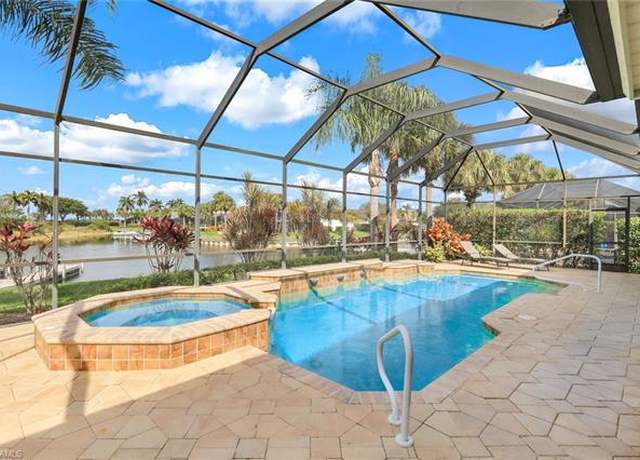 Property at 8733 Hideaway Harbor Ct, Naples, FL 34120, 4 beds, 4 baths
