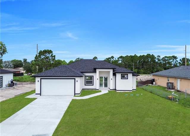 Property at 720 Castlestone Ave S, Lehigh Acres, FL 33974, 3 beds, 3 baths