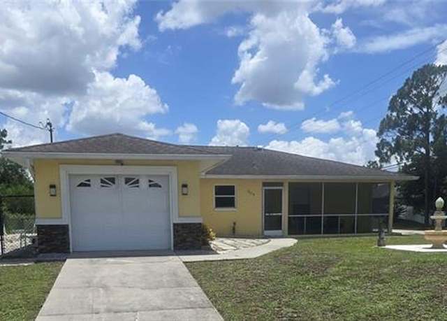 Property at 2619 10th St W, Lehigh Acres, FL 33971, 3 beds, 2 baths